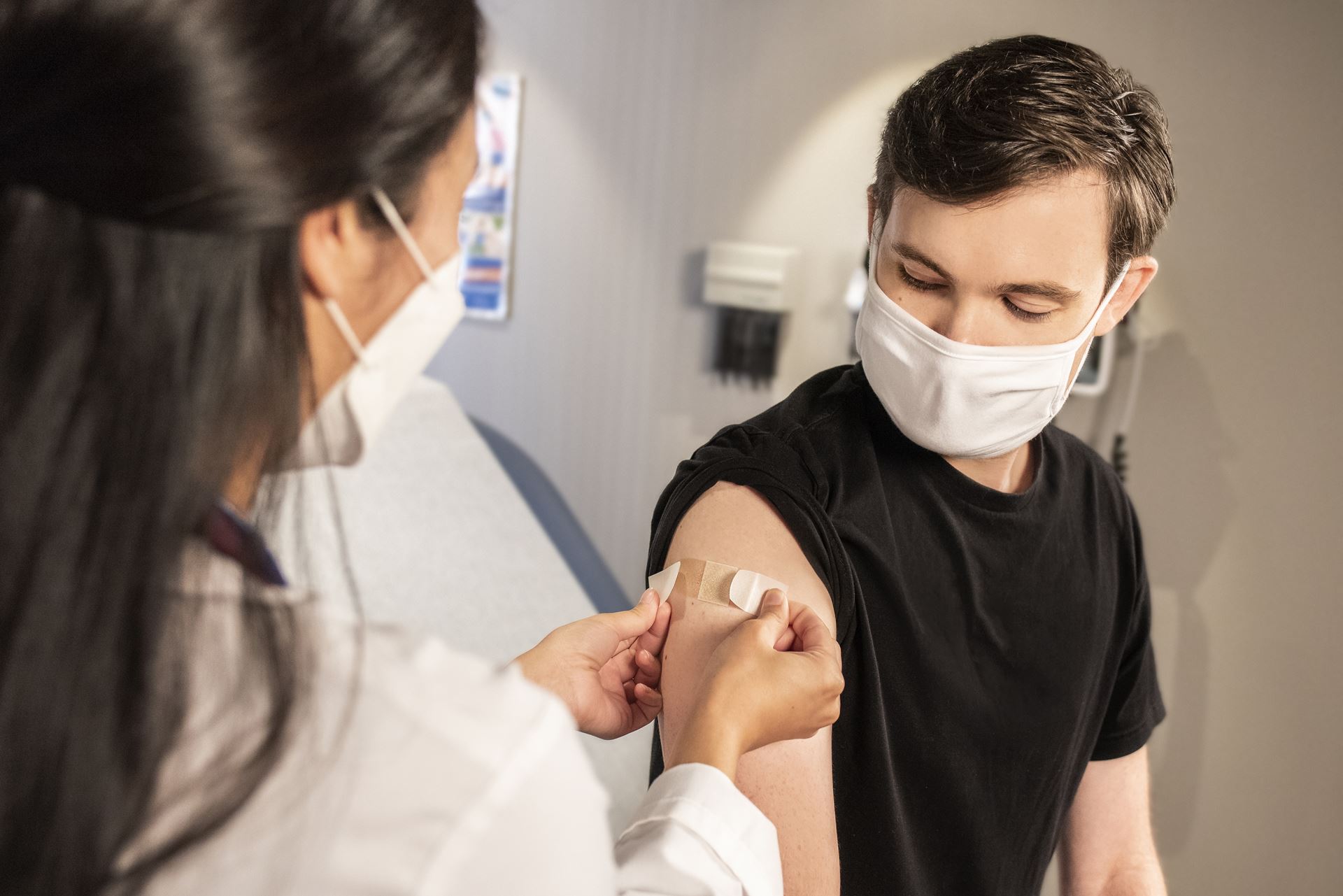 Clinician administering a vaccination